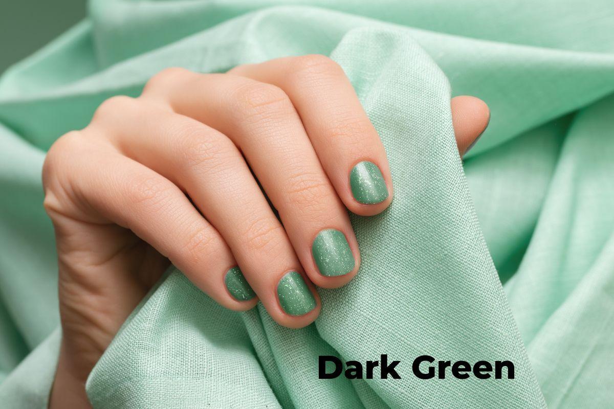 Dark green nails featuring chic styles, including glossy finishes and elegant designs, perfect for a stylish look